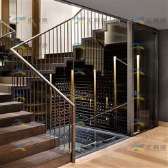 楼梯口位置地下室酒窖 金色不锈钢酒柜定制设计